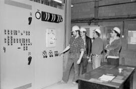 Des travailleurs de la compagnie des Produits forestiers Saucier à Lebel-sur-Quévillon