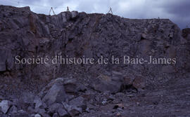 Wall of open pit, Merrill with fault.