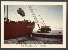 Offloading the Chesley A. Crosbie in early october. The last ship in the High Artic in 1975