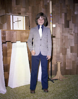 Enfant lors de sa profession de foi