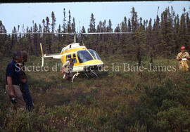 Helicopter in bush hole at Mistassini.