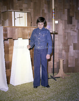 Enfant lors de sa profession de foi