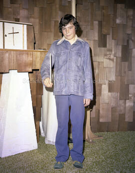 Enfant lors de sa profession de foi